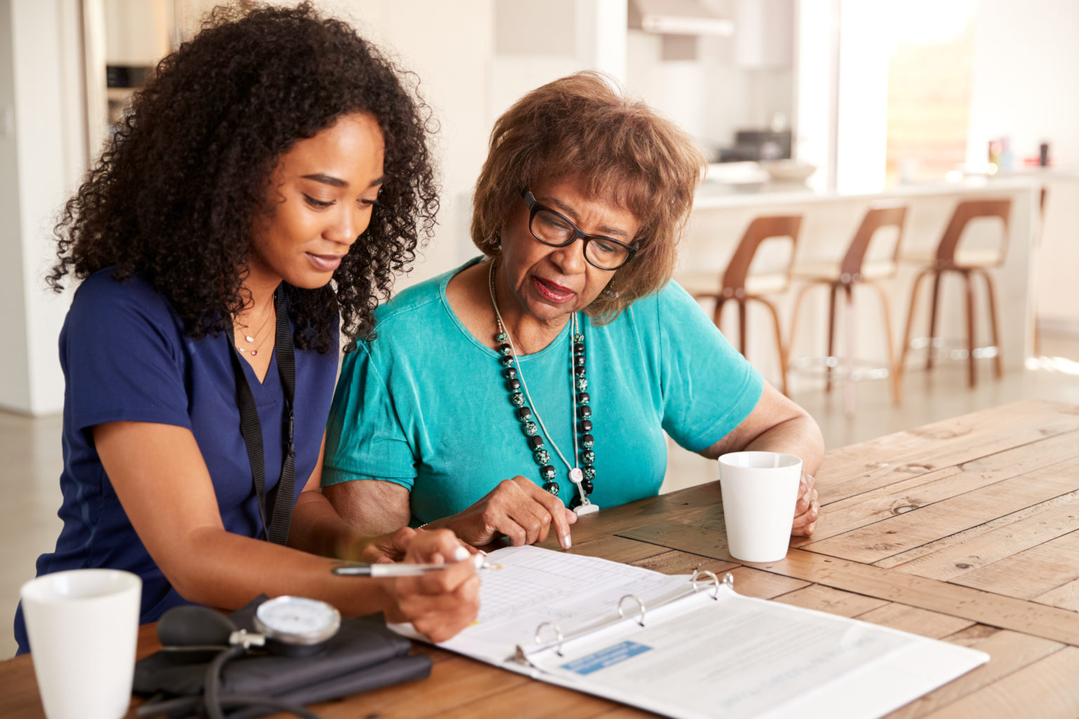 health provider helping older woman